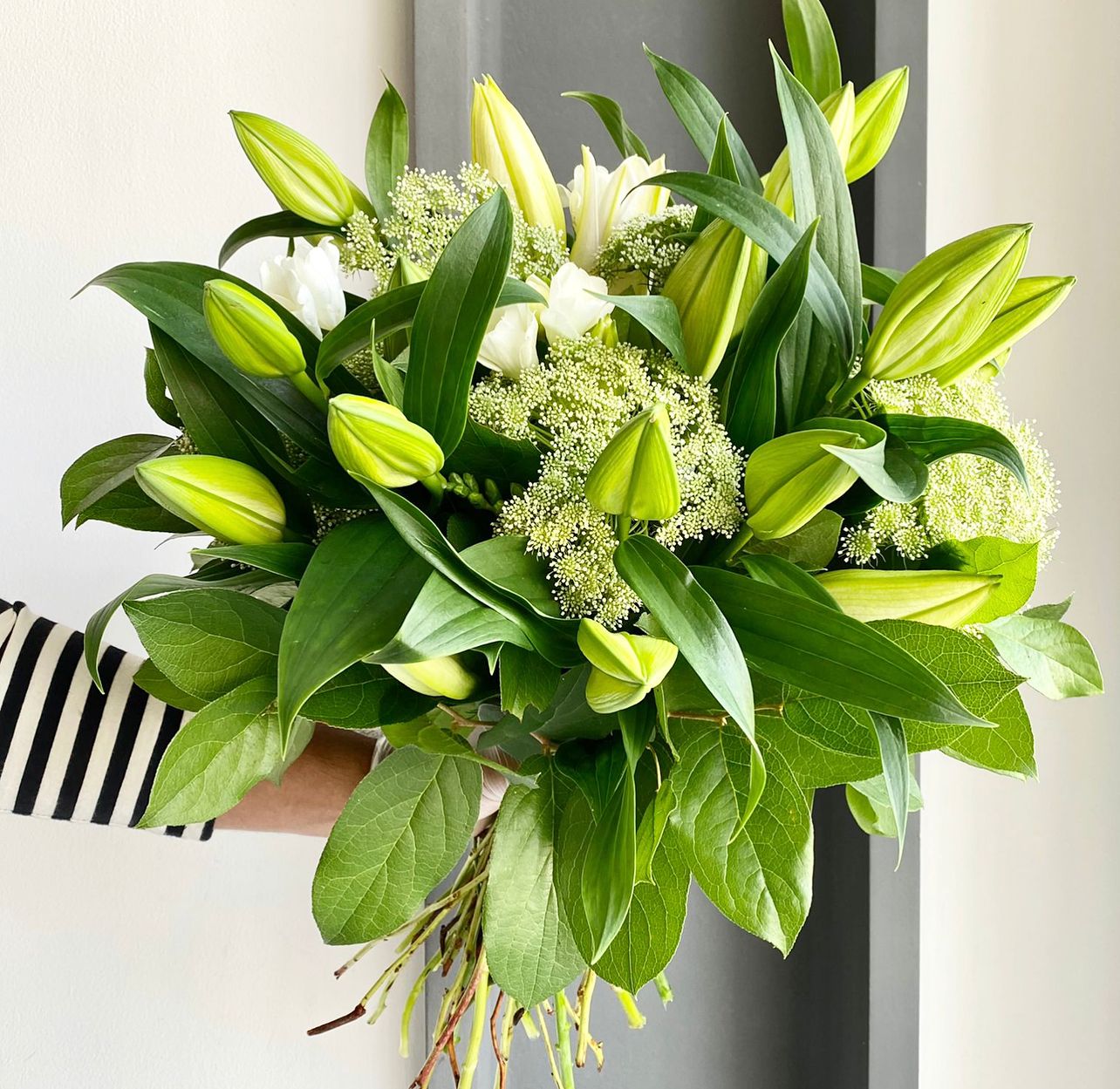 Florette AUSTIN - A lovely bouquet with a beautiful combinations of ammi, lilies and salal leaves.