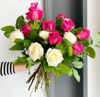 Florette BERLIN - A lovely bouquet with a mixture of white, dark pink roses, and lemon leaves. 
